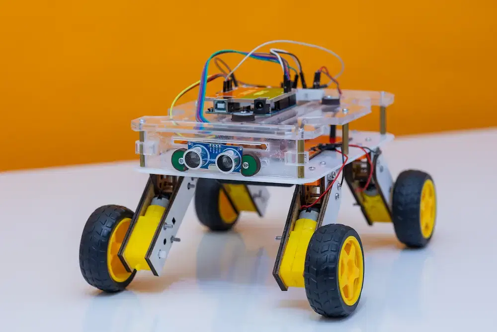 Assembled Dext robot on brand background